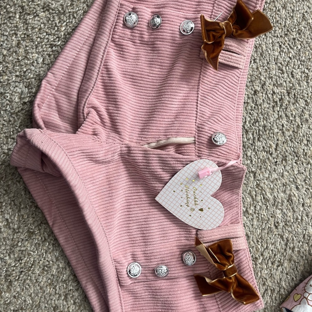 Pink Ribbed Shorts with Brown Bows